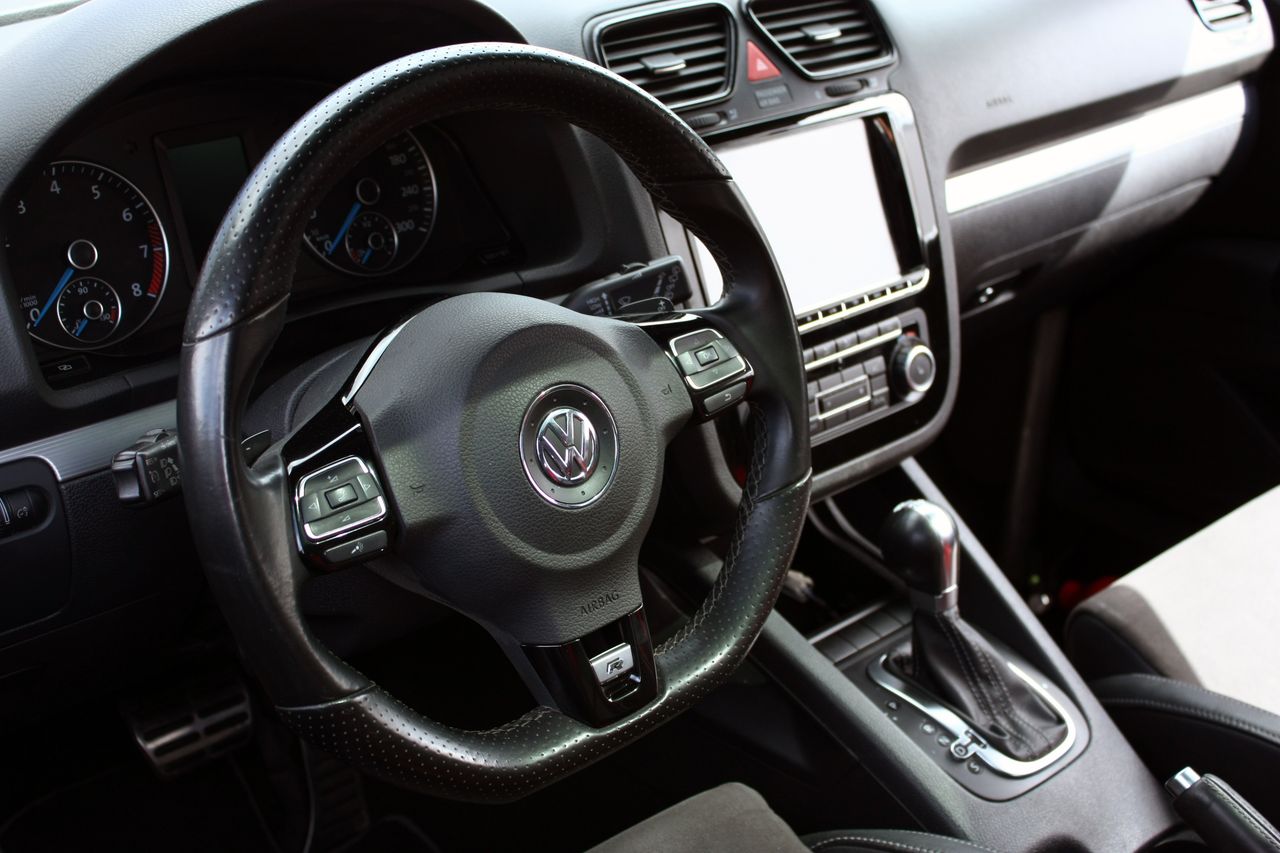 Explore the sleek interior and dashboard of a modern Volkswagen car, showcasing advanced features and design.